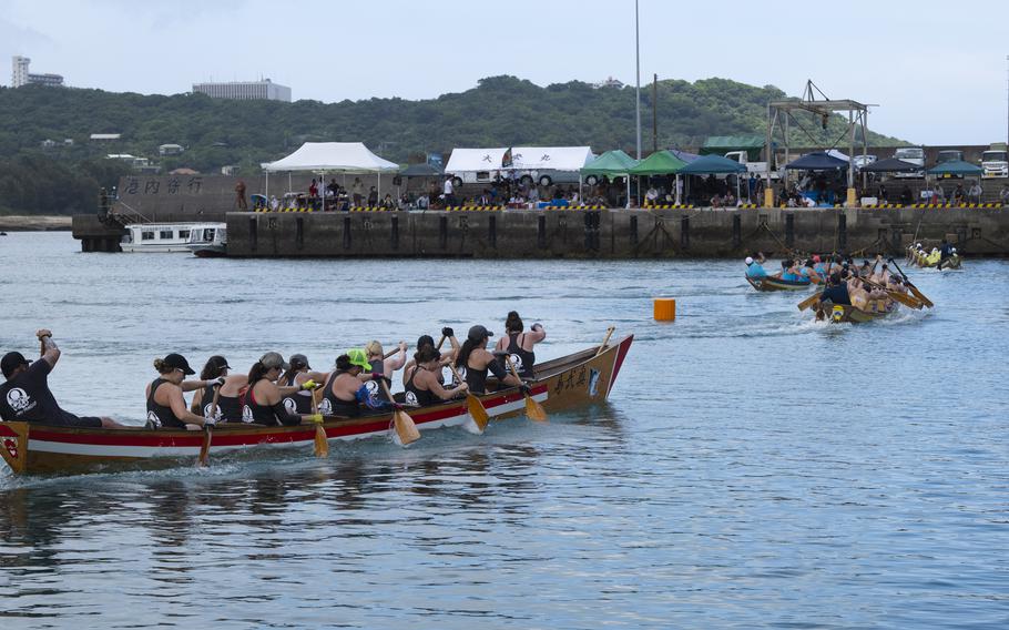 Several boats competing in a boat race.